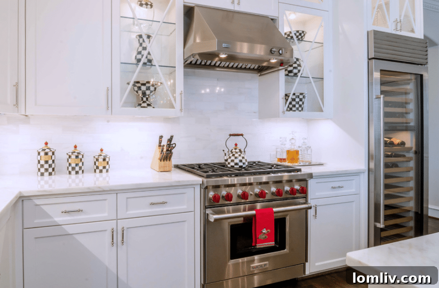 Luxurious White Kitchen Design with Island by Sharon Flatley