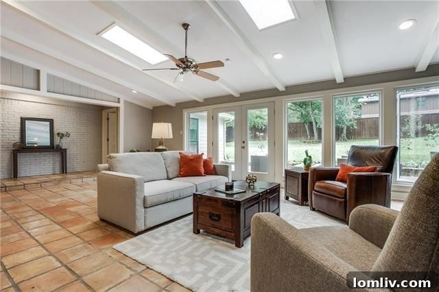 Spacious Dining Area with Mid-Century Chandelier at 8515 San Leandro Dr