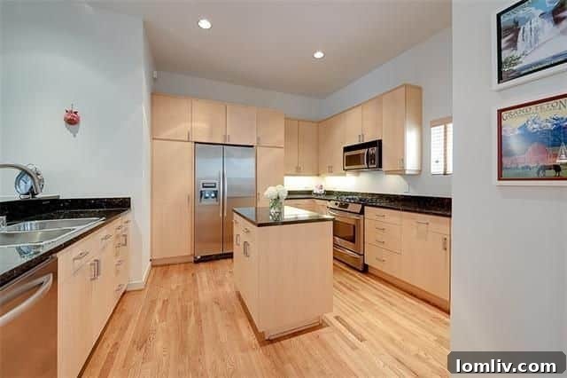 Contemporary Kitchen with Breakfast Bar at 4022 Travis St, Unit C