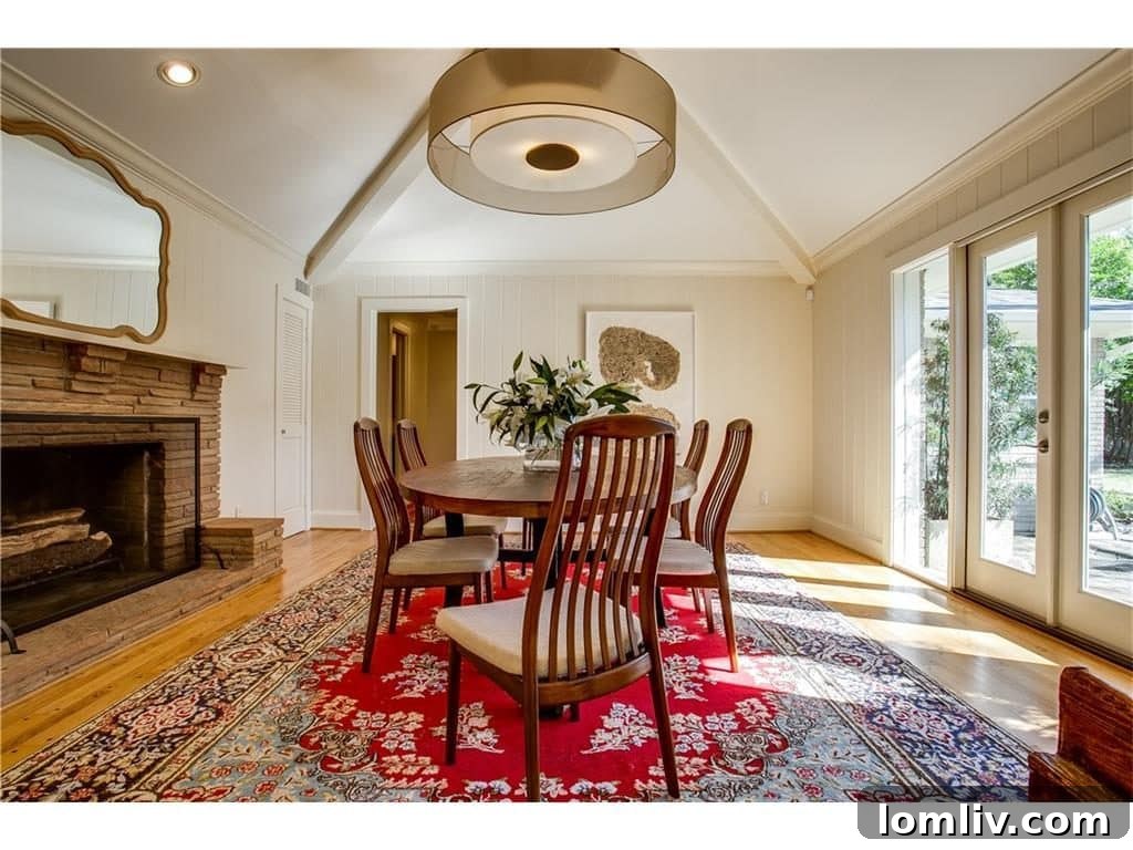 Vaulted dining room with a fireplace, perfect for intimate gatherings or extended entertaining