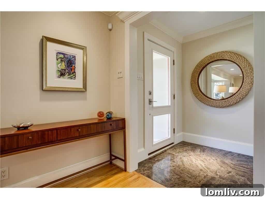 Cozy fireplace in the main living area, showcasing the home's timeless updates