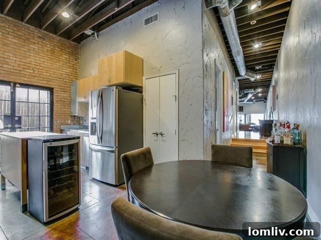 Modern kitchen with stainless steel appliances and large island