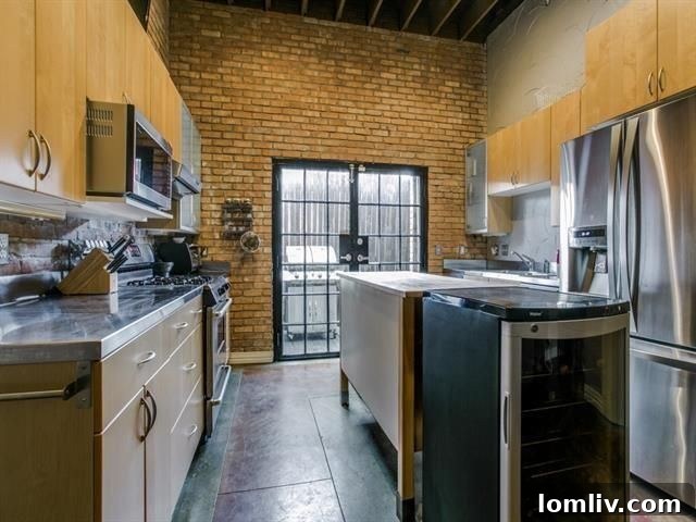 Sleek stainless steel countertops and range in the kitchen