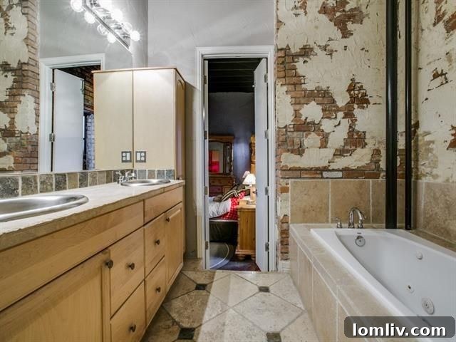Utility room with washer and dryer, awaiting custom finishes
