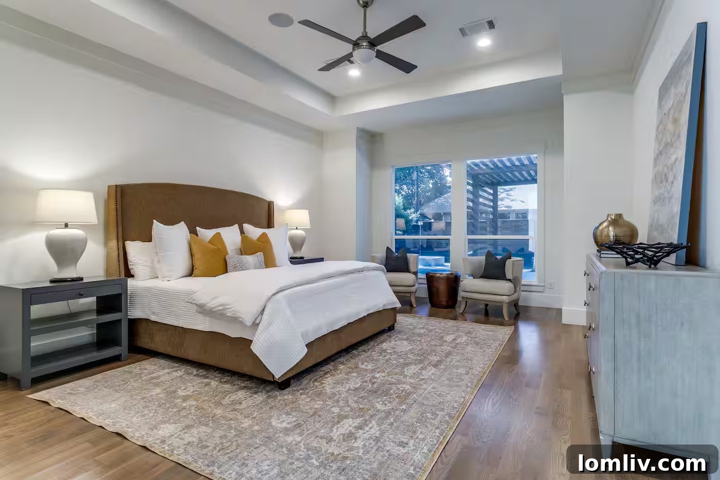 Sophisticated living room with high ceilings and abundant natural light inside Bryson DeChambeau's former Dallas home.