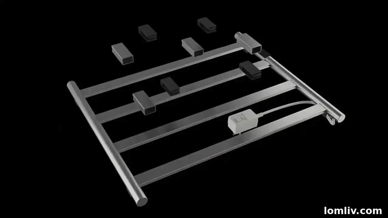 Electrician installing a wall-mounted electric towel rail in a modern bathroom