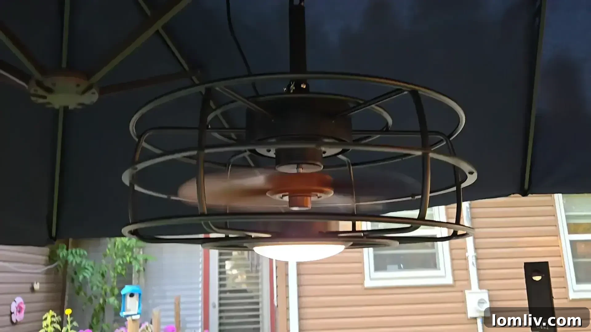 Modern outdoor ceiling fan enhancing a patio