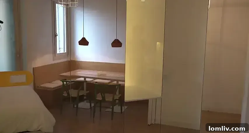 A room featuring a strategically placed mirror and a skylight, enhancing natural light and perceived space.