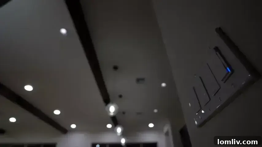 Modern smart lighting solutions like wall sconces and pendant lights in a compact living area.