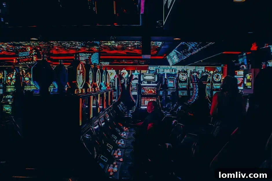 Multicolored casino interior with slot machines and gaming tables.