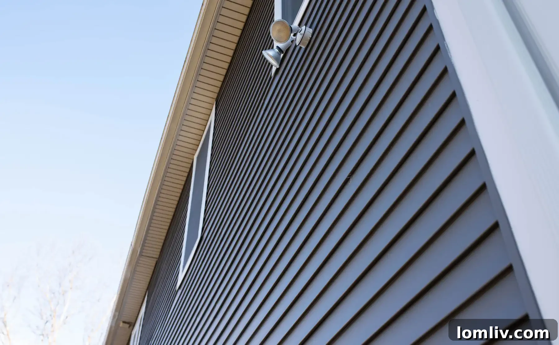 A pristine, well-maintained home exterior featuring durable siding that stands strong against the elements.