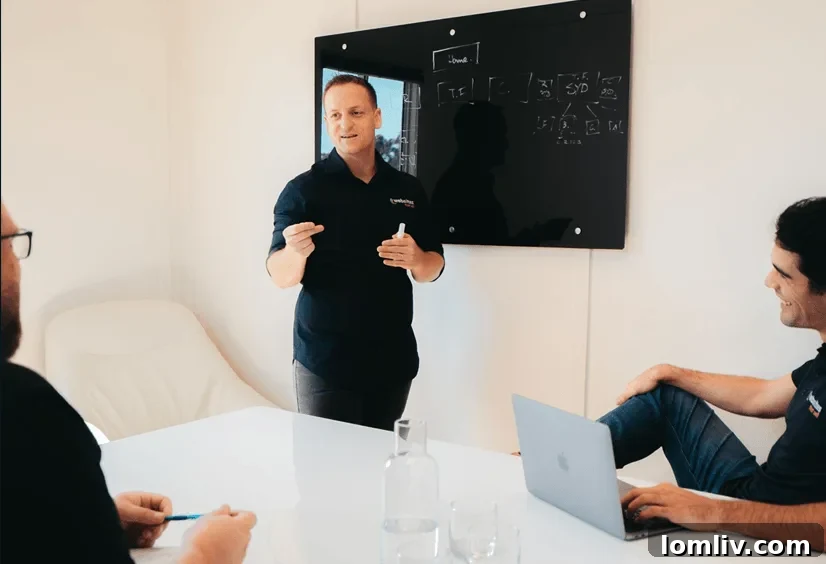 Smiling business team collaborating in a modern office environment