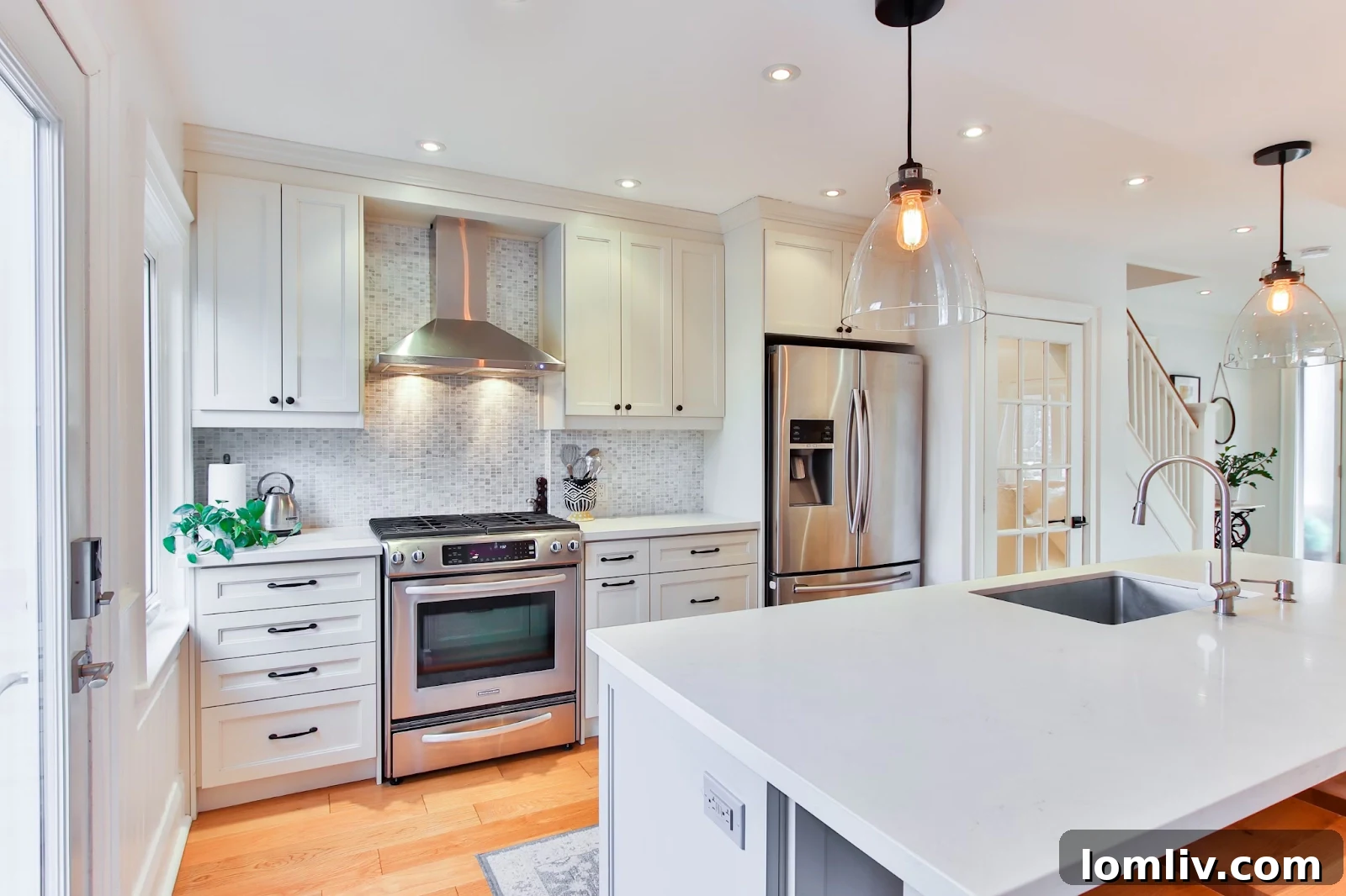 Unlock Your Kitchen's Potential with Smart Flow and Function 2 Modern kitchen with an island, showcasing excellent design flow and aesthetic appeal.