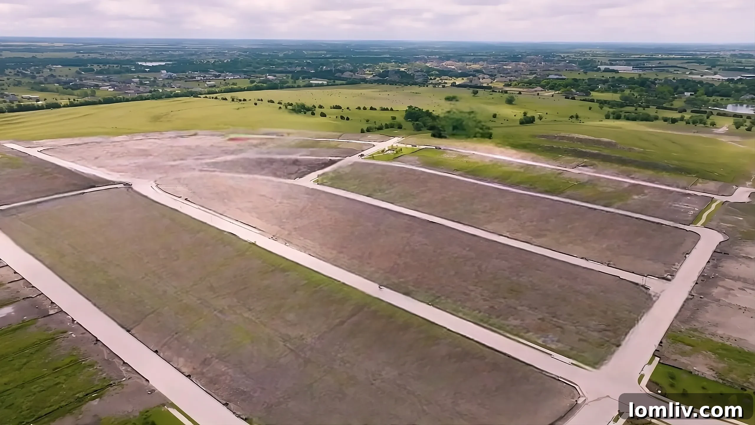 Rockwall, Texas cityscape with modern buildings and green spaces, symbolizing growth and development.