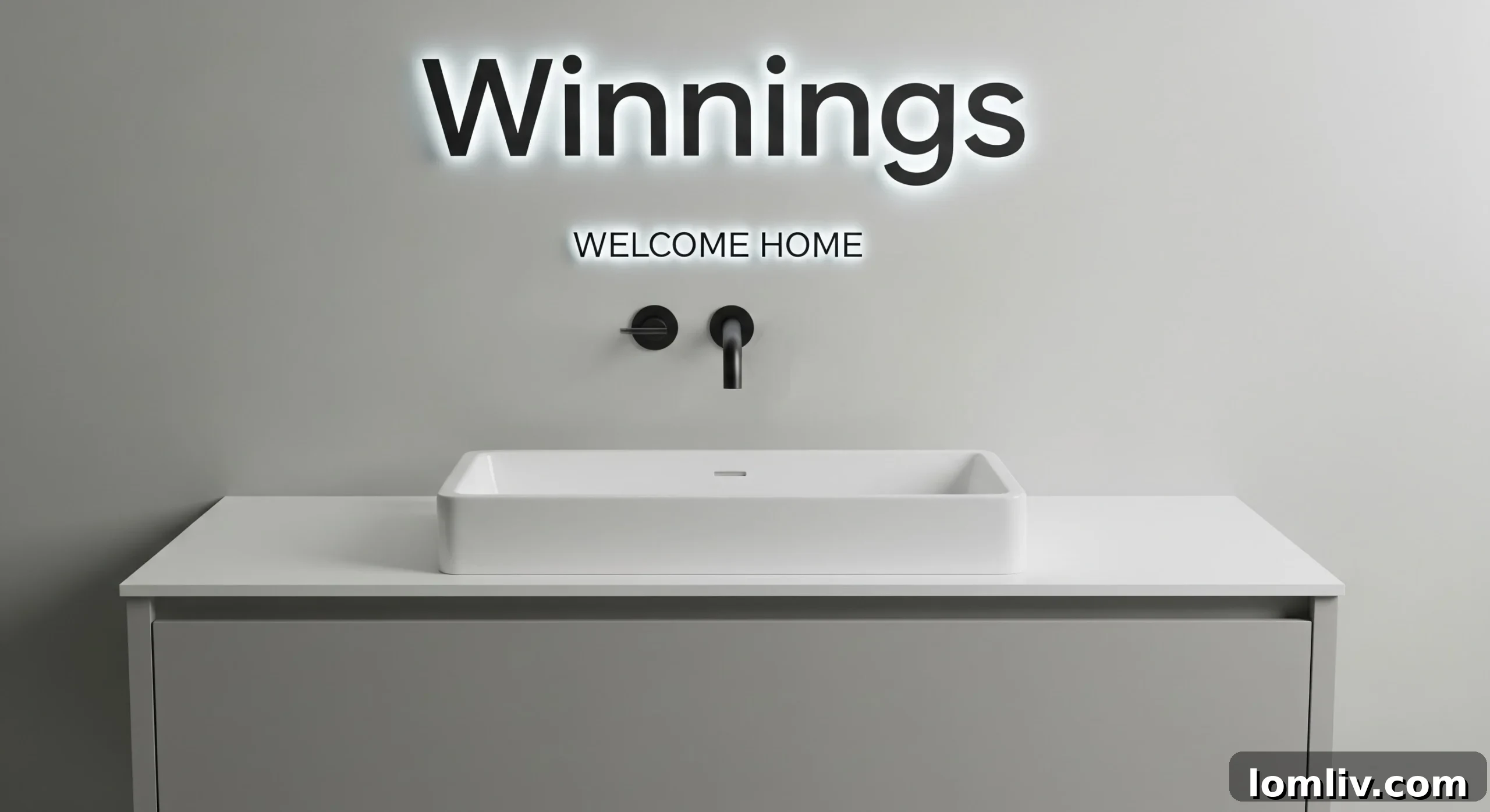 Modern chrome basin tap on a white countertop with a minimalist basin, highlighting sleek design for contemporary bathrooms.