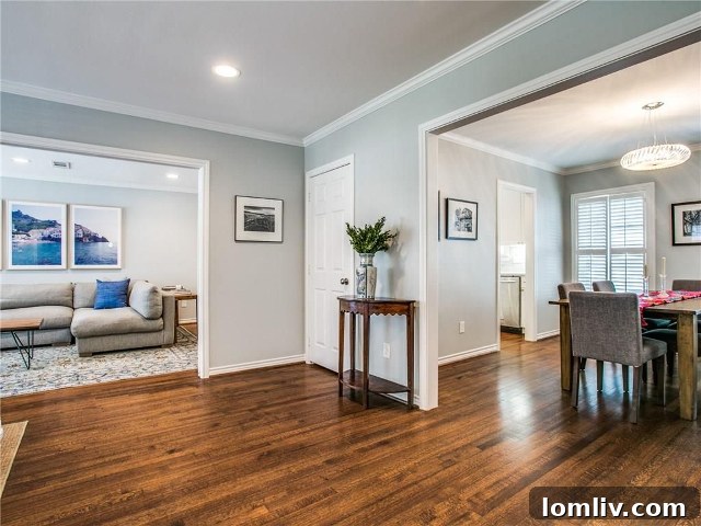 Casual living space at 4433 Hyer, with a wall of windows and an open view to the kitchen