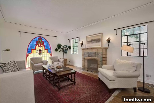 The charming courtyard view reflected in the mirror opposite the round window.