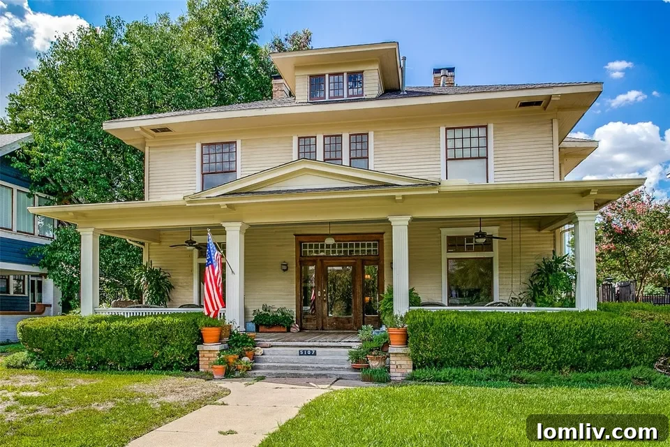 A grand historic home in Munger Place, showcasing early 20th-century architecture.