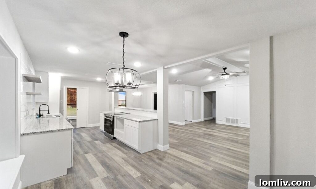 Outdoor swimming pool and spacious patio area, perfect for entertaining