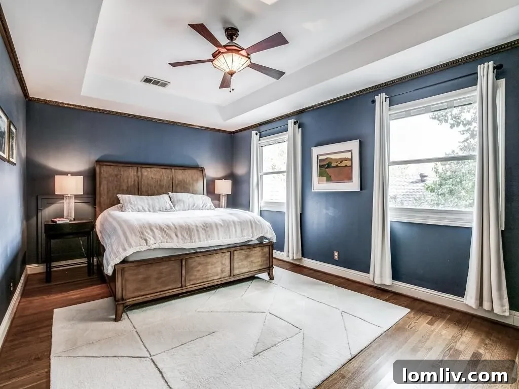 M Streets Tudor: Crafted with Care, Lived with Love 10 Walk-in closet with custom shelving in the primary suite