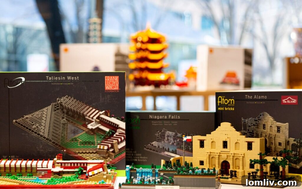 Children and adults collaborating on a LEGO building project during a workshop at AD | EX.