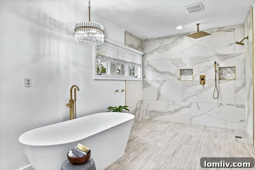 Contemporary Primary Bathroom with Freestanding Chandelier-Lit Tub