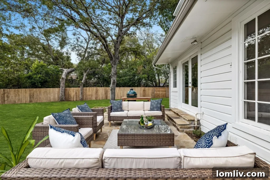 Expansive Backyard with Large Green Space and Flagstone Porch