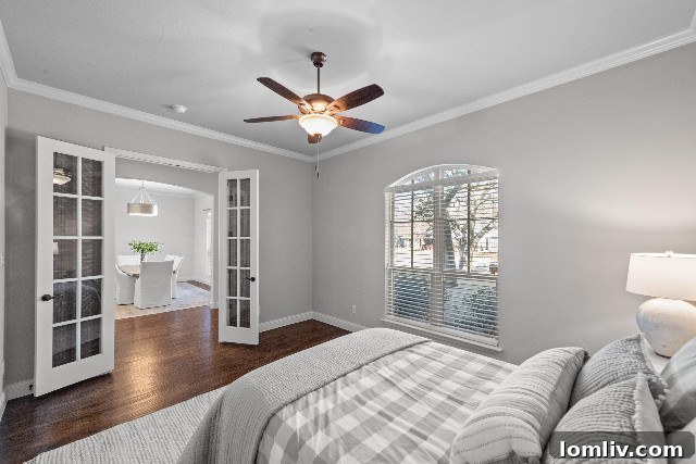 Versatile room with French doors and ensuite bathroom, suitable as a fourth bedroom or private study