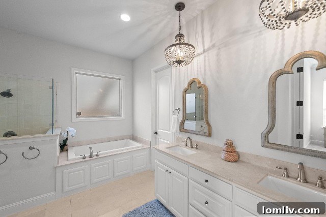 Luxurious primary bathroom with soaking tub and separate shower in Westcliff Fort Worth home