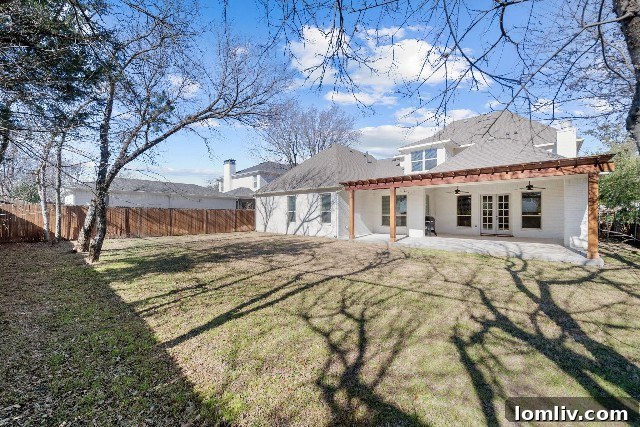 Spacious covered patio in backyard of Westcliff home, ready for a pool or outdoor kitchen