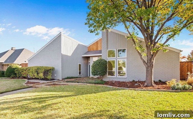 Lush front yard landscaping at 7216 Arbor Oaks Drive