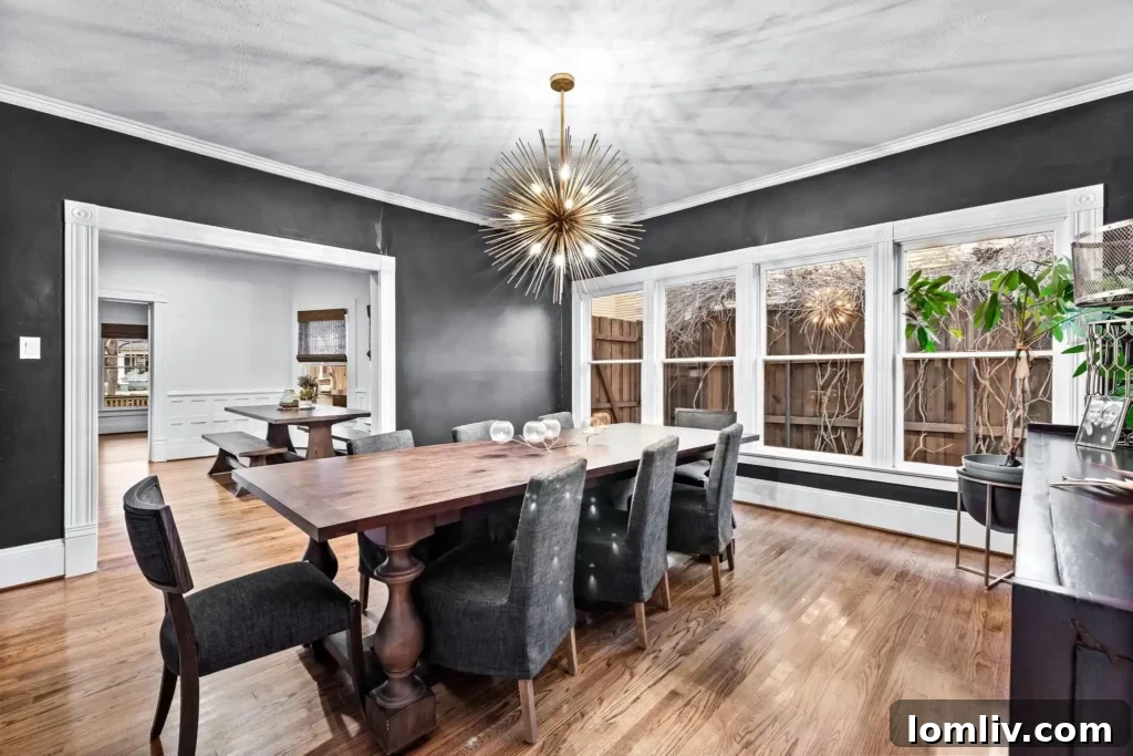 Bright and airy formal dining room with modern starburst chandelier