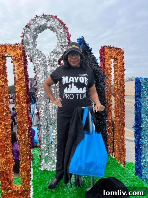 Mayor Pro Tem Carolyn King Arnold addressing a crowd at the 2023 Martin Luther King Jr. Day Parade, embodying community leadership.