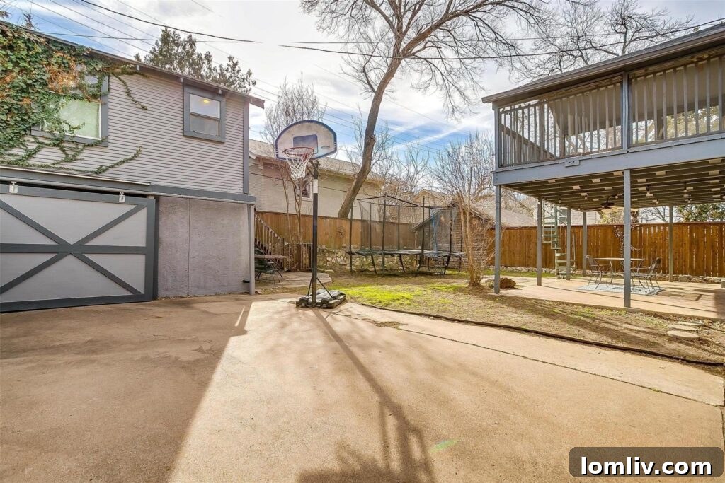 Rear View of Berkeley Place Home with Detached Garage and Apartment