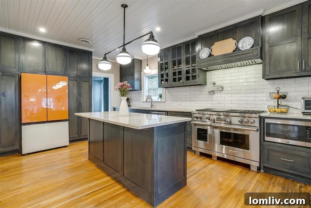 Stunning Modern Kitchen with 60-Inch Chef's Range and Floor-to-Ceiling Melon-Toned Cabinetry