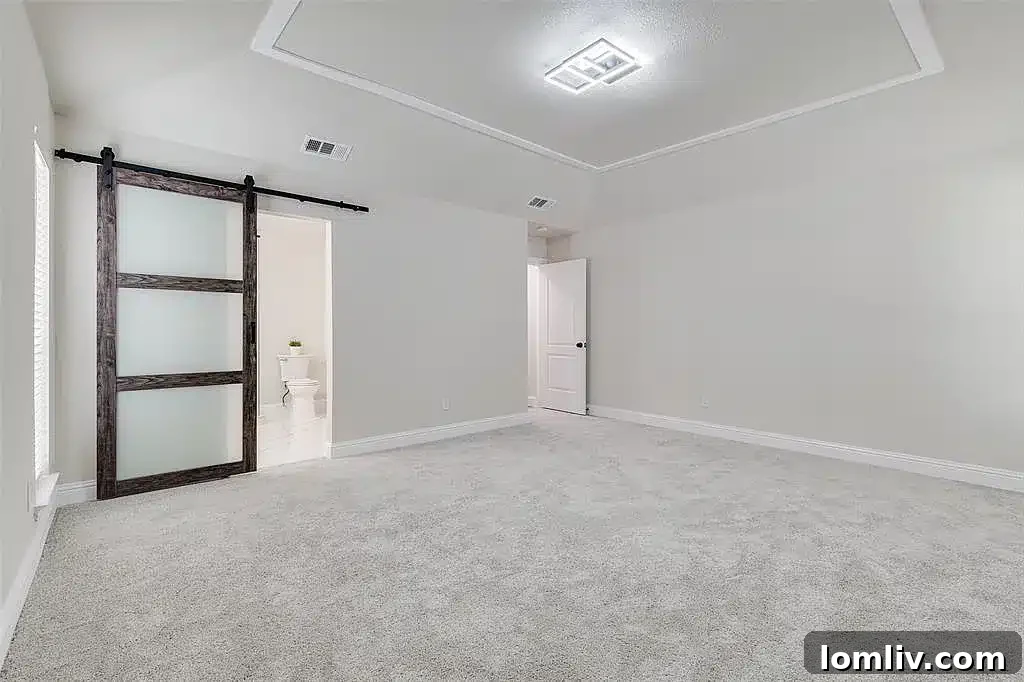 A comfortable and stylish bedroom in the Plano home, ready for occupancy.