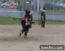 Kids playing baseball in a humorous and uncoordinated manner