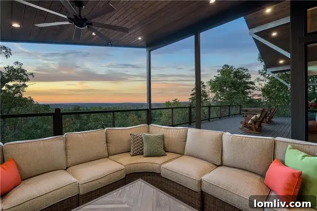 Wide view of the luxury cabin 'Above and Beyond' nestled in the scenic Broken Bow woods