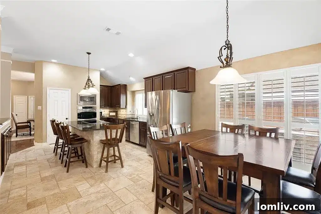 Elegant dining room with chandelier and ample seating at 3513 Cottonwood Springs Drive