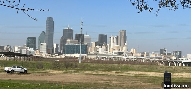 Downtown Dallas skyline view from the Oakhouse groundbreaking site on East Colorado Blvd., highlighting the strategic location.