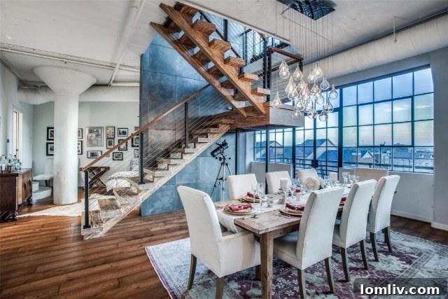 Expansive living area with high ceilings in a modern loft