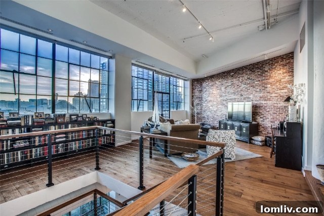 Stylish spiral staircase connecting two levels of a loft apartment