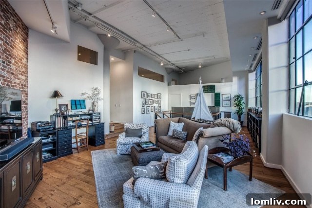 Cozy bedroom with exposed brick wall in a multi-level loft