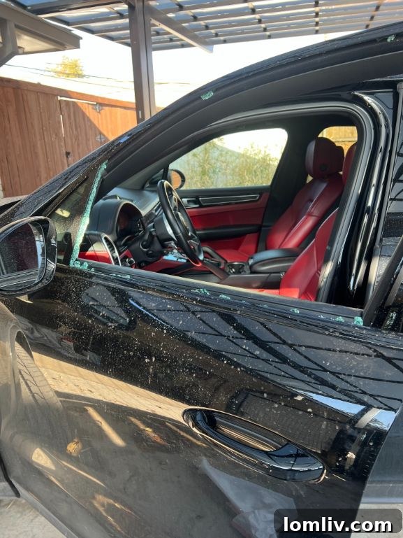Another perspective of the damage to Rita Goodsell’s car, showing the extent of the break-in.