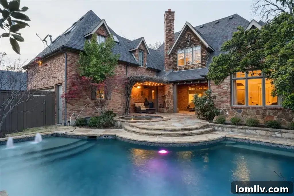 Luxury Pool and Spa with Tanning Ledge and Water Feature