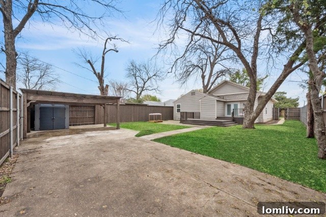 Charming backyard space with a privacy fence