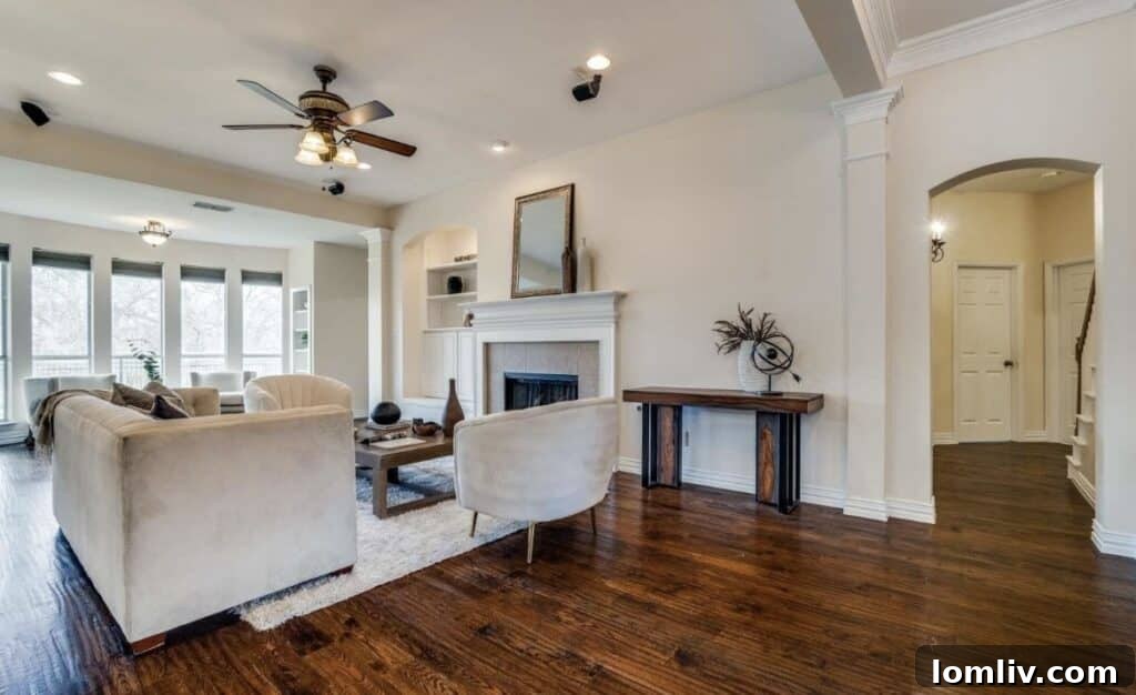 Elegant living room with hardwood floors and neutral decor