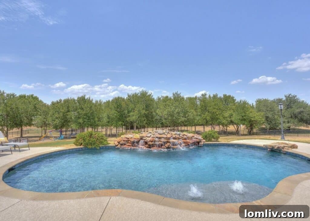 Luxurious backyard with a sparkling pool and outdoor living space