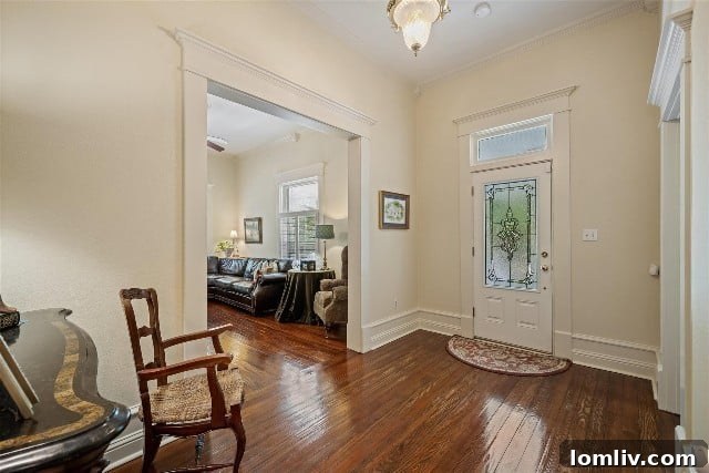 Interior view of a historic Grandview home, showcasing twelve-foot ceilings, original hardwood floors, and intricate baseboard molding.