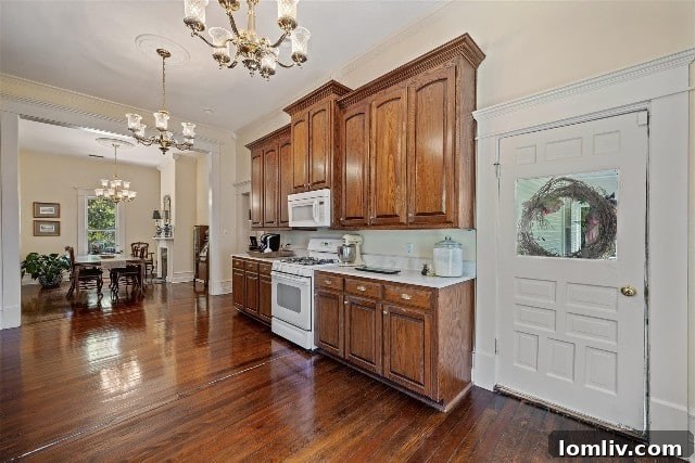 An empty room within the historic Grandview home, showcasing high ceilings and original details, ready for a new family's touch.